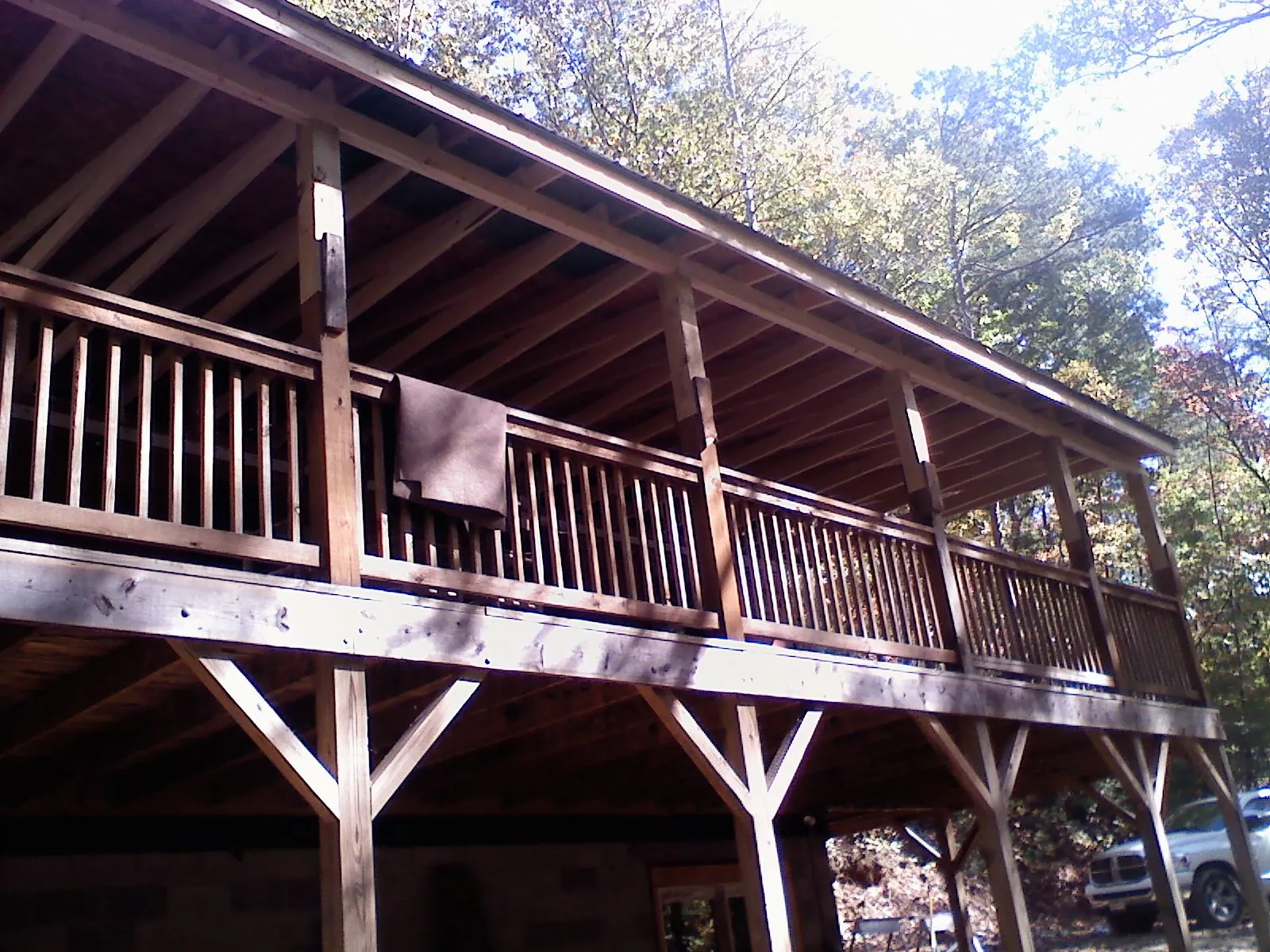 Timber framing under a new elevated porch and deck — Roof Leak Repair in Wilsonville by Roofing Brothers